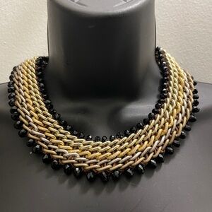 Elegant Gold and Black Woven Necklace